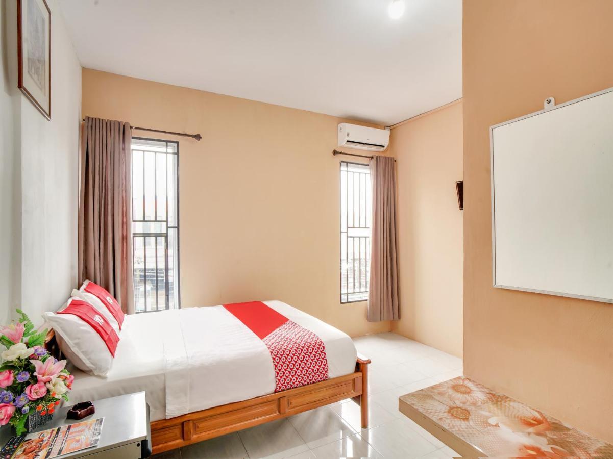 Oyo 90024 Botania Homestay & Cafe Nongsa Luaran gambar